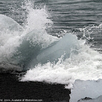 Buy canvas prints of Blocks of glacial ice hit by ocean waves by Lensw0rld 