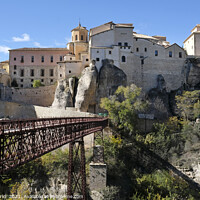 Buy canvas prints of Footbridge and beautiful buildings in Cuenca, Spain, on a sunny day by Lensw0rld 