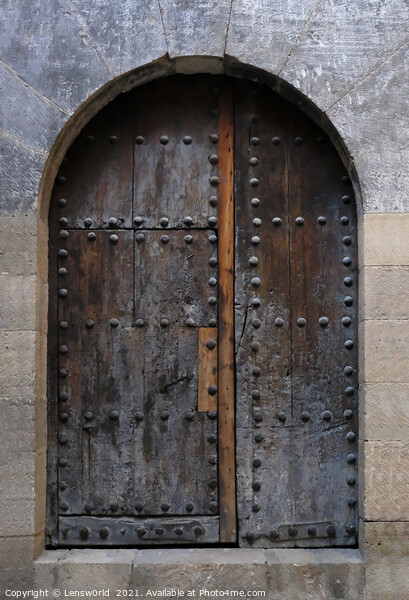 Old weathered wooden door in an old building Picture Board by Lensw0rld 