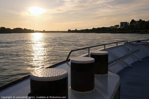 Sunset over water seen from a boat on the Rhine river  Picture Board by Lensw0rld 