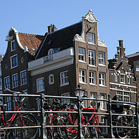 Buy canvas prints of Amsterdam - Bikes, Bridges, Buildings by Lensw0rld 