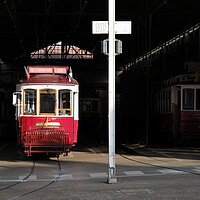 Buy canvas prints of Traditional tram wagon waiting in the shade of the station in Lisbon by Lensw0rld 