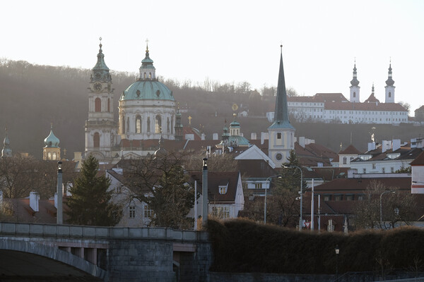 Church towers and historic buildings in the evening sun in Prague Picture Board by Lensw0rld 