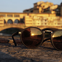 Buy canvas prints of The sun sets over Ponte Vecchio in Florence, Italy by Lensw0rld 