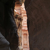Buy canvas prints of Spotting the Treasury through the Siq in Petra by Lensw0rld 
