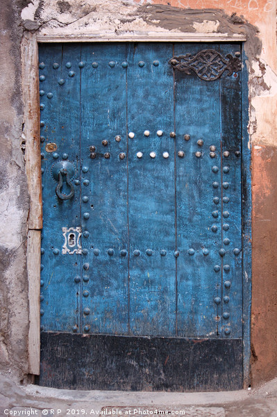 Ancient blue door in the old town of Marrakesh Picture Board by Lensw0rld 