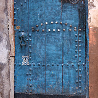 Buy canvas prints of Ancient blue door in the old town of Marrakesh by Lensw0rld 