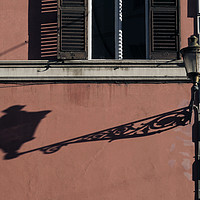 Buy canvas prints of A street light in Rome throwing a long shadow by Lensw0rld 