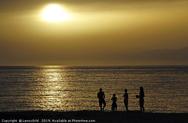 Silhouettes of a family at the beach in Crete duri Picture Board by Lensw0rld 