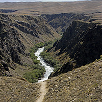 Buy canvas prints of Trail turning into river - Black Canyon, Kazakhsta by Lensw0rld 