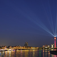 Buy canvas prints of Light show from Düsseldorf's "Rheinturm" at night by Lensw0rld 