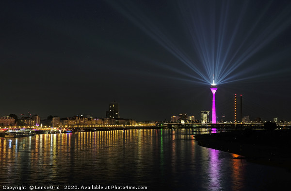 Light show from Düsseldorf's "Rheinturm" at night Picture Board by Lensw0rld 