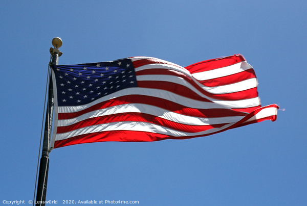 American flag waving on a sunny day Picture Board by Lensw0rld 