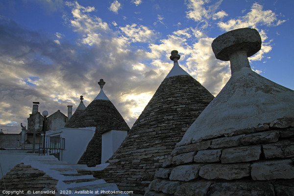 Sunset and Trulli in Alberobello, Italy Picture Board by Lensw0rld 