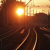Buy canvas prints of Sunset reflected on train tracks by Lensw0rld 