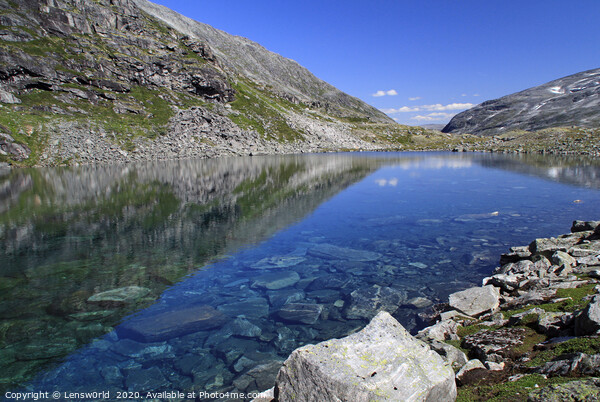 Small lake with clear meltwater in Norway Picture Board by Lensw0rld 