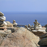 Buy canvas prints of Stacked rocks at the coast of Mykonos by Lensw0rld 
