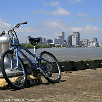 Buy canvas prints of Bicycle leaning at the pier near New Orleans by Lensw0rld 