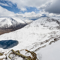 Buy canvas prints of Winter view of Ben Macdui, Cairn Toul and Lochan Uaine, Cairngorms by Justin Foulkes