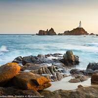 Buy canvas prints of La Corbiére lighthouse, Jersey, Channel Islands by Justin Foulkes