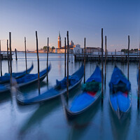 Buy canvas prints of Gondolas at sunrise, Venice, Italy by Justin Foulkes
