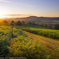 Buy canvas prints of Sunrise over the Shropshire Hills by Justin Foulkes