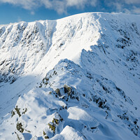 Buy canvas prints of Striding Edge, in winter, Helvellyn by Justin Foulkes