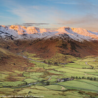 Buy canvas prints of Crinkle Crags and Bowfell, sunrise, Lake District by Justin Foulkes