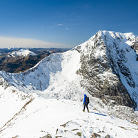 Buy canvas prints of Mountaineer on the Carn Mor Dearg arete, Ben Nevis by Justin Foulkes