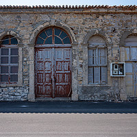 Buy canvas prints of Seafront Buildings Karlovasi by mark Smith