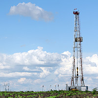 Buy canvas prints of land oil drilling rig on field landscape by goce risteski