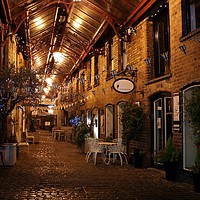Buy canvas prints of Enchanting Nighttime Shopping in Staffordshire by tammy mellor