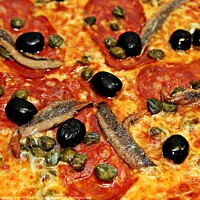 Buy canvas prints of PEPPERONI AND ANCHOVIES PIZZA by OTIS PORRITT