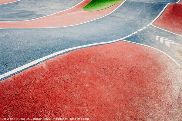 Detail of the asphalt and the white lines of a pumptrack circuit Picture Board by Joaquin Corbalan