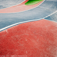 Buy canvas prints of Detail of the asphalt and the white lines of a pumptrack circuit by Joaquin Corbalan
