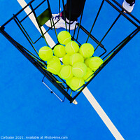 Buy canvas prints of Basket full of yellow tennis balls for training tennis players o by Joaquin Corbalan