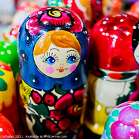 Buy canvas prints of Beautiful wooden Russian-style matryoshka dolls. by Joaquin Corbalan
