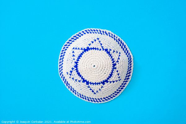 Kippah is a circular hat, with the flag of Israel, isolated on a Picture Board by Joaquin Corbalan