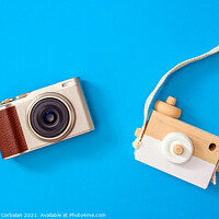 Buy canvas prints of Two cameras, one modern and one old, compared one next to the ot by Joaquin Corbalan