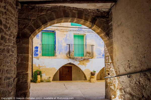 An old town with blue painted houses, on the Mediterranean coast Picture Board by Joaquin Corbalan