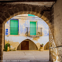 Buy canvas prints of An old town with blue painted houses, on the Mediterranean coast by Joaquin Corbalan