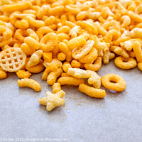 Buy canvas prints of Detail of a snack based on flavored cheese puff, with corn flour by Joaquin Corbalan