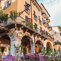 Buy canvas prints of Desenzano del Garda, Italy - September 21, 2021: Terrace of a pi by Joaquin Corbalan