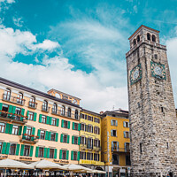 Buy canvas prints of Riva del Garda, Italy - September 22, 2021: Colorful streets of  by Joaquin Corbalan
