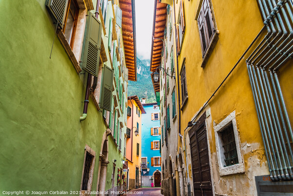 Narrow and colorful streets in a typical Italian village on the  Picture Board by Joaquin Corbalan