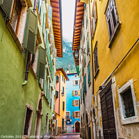 Buy canvas prints of Narrow and colorful streets in a typical Italian village on the  by Joaquin Corbalan