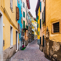 Buy canvas prints of Old and narrow streets of beautiful typical Italian colors on a  by Joaquin Corbalan