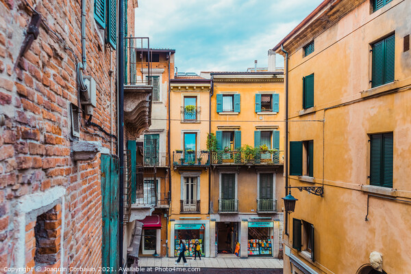 Verona, italy - october 1, 2021: alleys of Verona among which yo Picture Board by Joaquin Corbalan