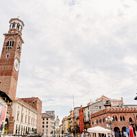 Buy canvas prints of Verona, Italy - October 1, 2021: Piazza delle Erbe on a cloudy d by Joaquin Corbalan