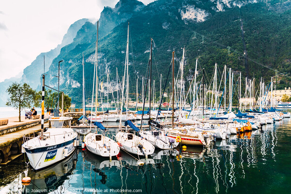 Riva del Garda, Italy - October 2, 2021: Boats and yachts moored Picture Board by Joaquin Corbalan